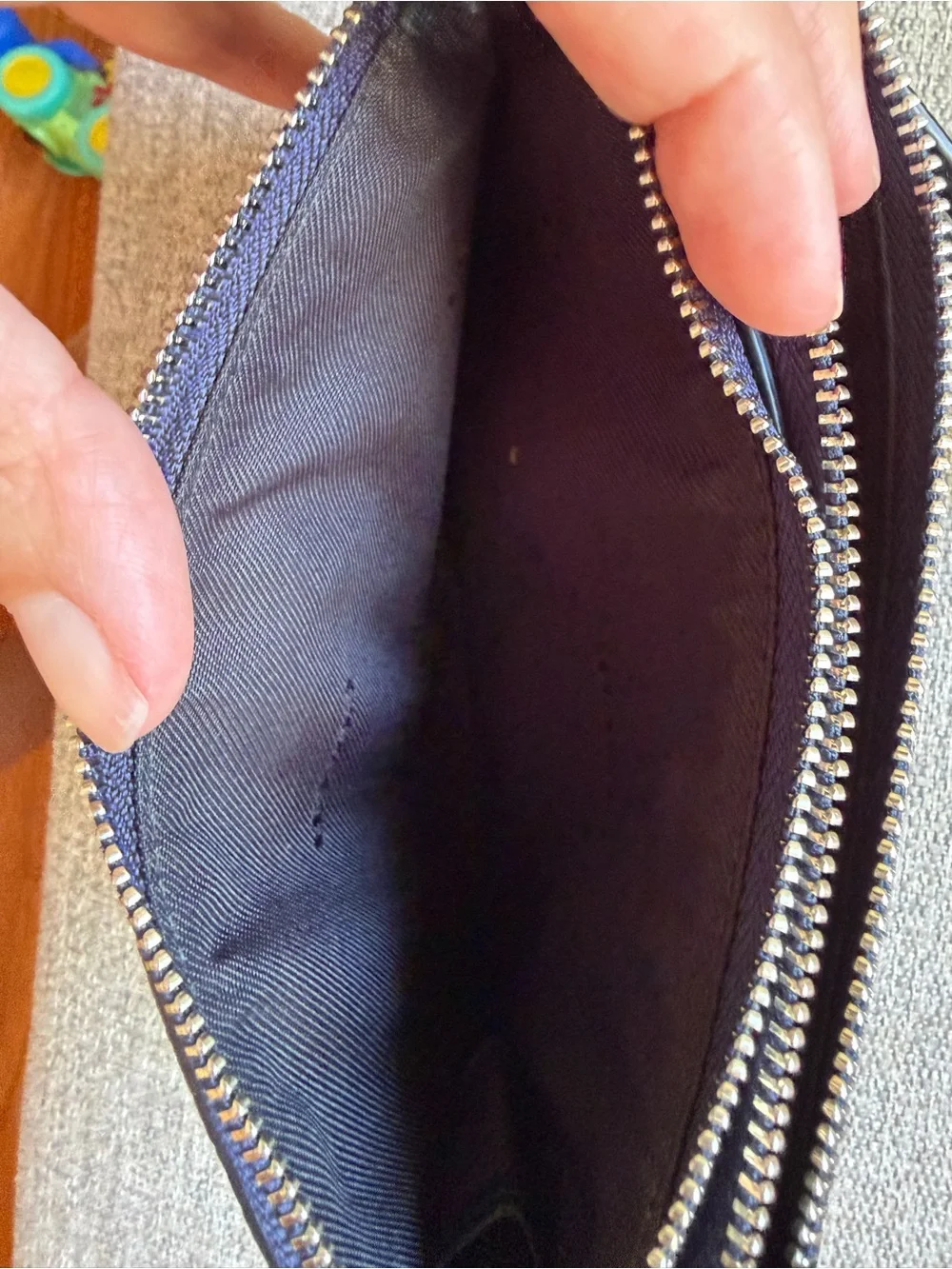 Coach Navy Pebbled Leather Wristlet with Gold Logo